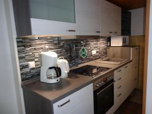 A kitchen or kitchenette at Haus am Weinberg