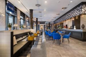 Holiday Inn - the niu, Square Mannheim by IHG tesisinde bir oturma alanı