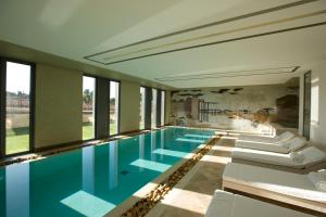 The swimming pool at or close to Domaine de Verchant & Spa - Relais & Châteaux