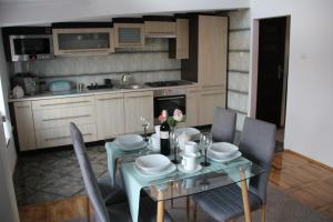 A kitchen or kitchenette at Marszałkowska Apartament RM HOUSE