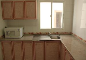 Una cocina o kitchenette en Royal Residence Hotel Apartments