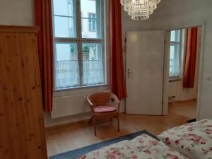 Una cama o camas en una habitación de Ferienwohnung Am Nauener Tor