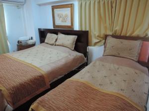 Cama ou camas em um quarto em Nikko Park Lodge Tobu Station