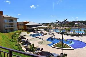 Piscina de la sau aproape de Ilhas do Lago Eco Resort by WAM Experience