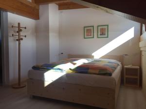 Cama ou camas em um quarto em Agriturismo Moiè