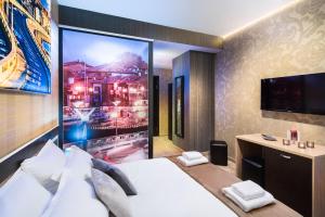 Central Point Boutique Hotel房間的床