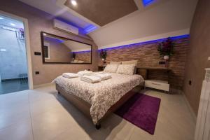 Vila Argola - Spa Luxury Apartments में एक कमरे में एक या कई बेड