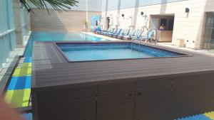 The swimming pool at or close to Royal M Hotel Fujairah by Gewan