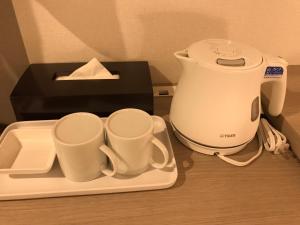 Coffee and tea making facilities at Kita Hotel