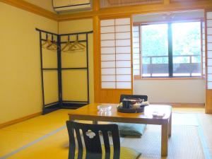 Naktsmītnes Ryokan Yamashiroya pilsētā Jufu fotogalerijas attēls