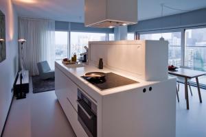 Kjøkken eller kjøkkenkrok på Urban Residences Rotterdam