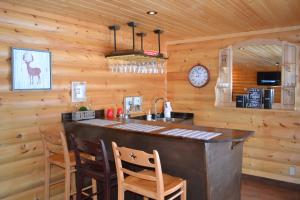 Kjøkken eller kjøkkenkrok på Selenia Lodge- Résidences et Chalets dans les Laurentides