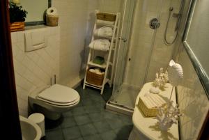 Un baño de Appartamento Le Corti