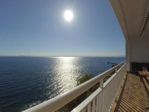 a view of the ocean from the balcony of a house at Apartament Belvedere in Roses