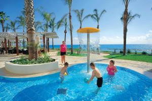 The swimming pool at or close to Alexander The Great Beach Hotel