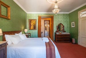 Cama ou camas em um quarto em Casa dos Arcos - Charm Guesthouse