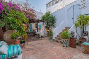 Um jardim em Casa dos Arcos - Charm Guesthouse