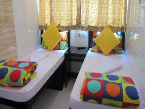 Tempat tidur dalam kamar di David Lounge