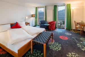 Säng eller sängar i ett rum på Seehotel Gotthard