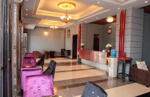 Гостиная зона в Hotel Kangaroo Bujumbura