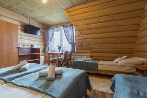 A bed or beds in a room at Agrotatry U Stachy