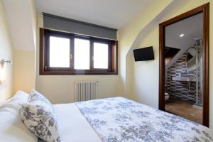 Una cama o camas en una habitación de Casa do Marqués