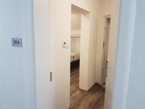 Кровать или кровати в номере Apartments AS Dubrave