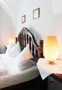 Cama ou camas em um quarto em Stadthotel Restaurant Auerhahn