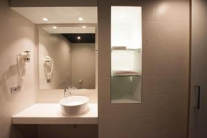 A bathroom at Hotel Carnia