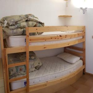 Una cama o camas en una habitación de La casa di Pila