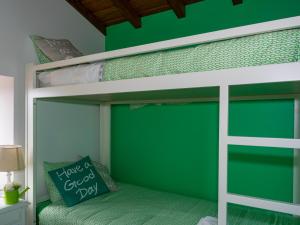 Cama ou camas em um quarto em Quintinha de Labrujó