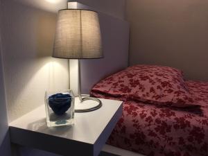 Кровать или кровати в номере Feeling at Home - Varese Apartment