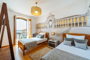 Cama ou camas em um quarto em Varandas de Lisboa - Tejo River Apartments & Rooms