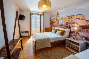 Cama ou camas em um quarto em Varandas de Lisboa - Tejo River Apartments & Rooms