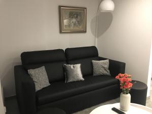 Svetainės erdvė apgyvendinimo įstaigoje Apartamenty AP 17