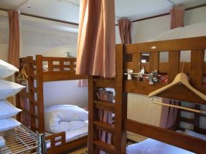 Ліжко або ліжка в номері Guesthouse Tamura