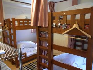 Ліжко або ліжка в номері Guesthouse Tamura