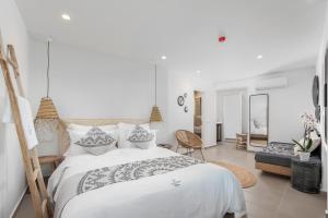 Cama ou camas em um quarto em Little Venice Villas