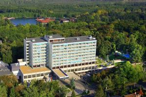 an overhead view of a large building with trees at Ensana Thermal Hévíz in Hévíz