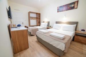 Tempat tidur dalam kamar di 9Bodrum Hotel