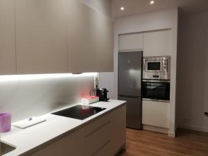 Dapur atau dapur kecil di ARENA Apartamento - Perla Boutique Apartamentos