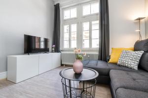 Телевізор і / або розважальний центр в Freiburg Appartements am Augustinerplatz