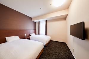 Телевизор и/или развлекательный центр в Hotel Wing International Kobe - Shinnagata Ekimae