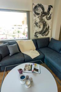 พื้นที่นั่งเล่นของ Heraklion chic and minimalistic apartment with sea view