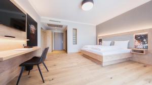 Heuboden Hotel Heu.Loft Freiburg房間的床