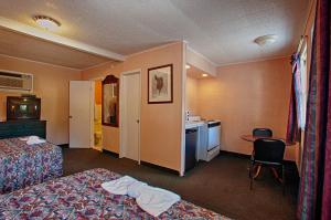 Postelja oz. postelje v sobi nastanitve Economy Motel Inn and Suites Somers Point