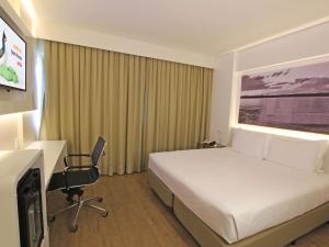 En TV eller et underholdningssystem på ibis Styles Brasilia Aeroporto