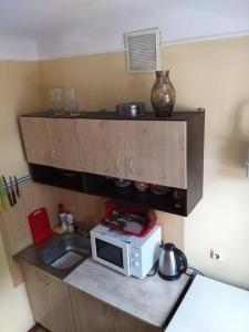 A kitchen or kitchenette at ZА