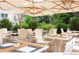 Un restaurante u otro lugar para comer en Grand Hotel Trento