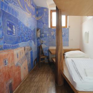 Ένα ή περισσότερα κρεβάτια σε δωμάτιο στο Hostel Celica